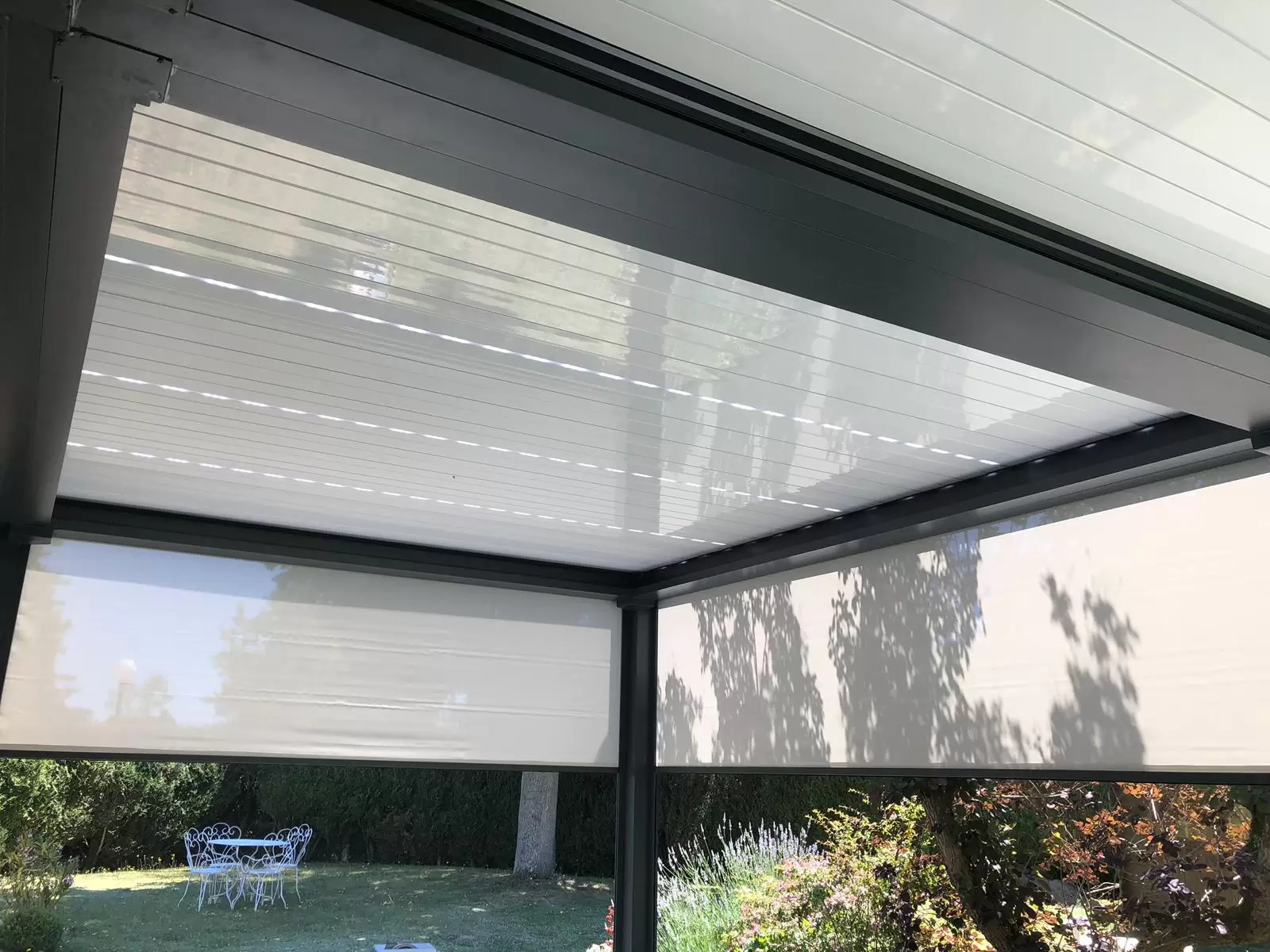 Vérandas, pergolas et SPA - Installation d'une pergola bioclimatique retractable sur SAINT ETIENNE DU ROUVRAY